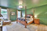 On the opposite side of the main floor you'll find this spacious primary suite