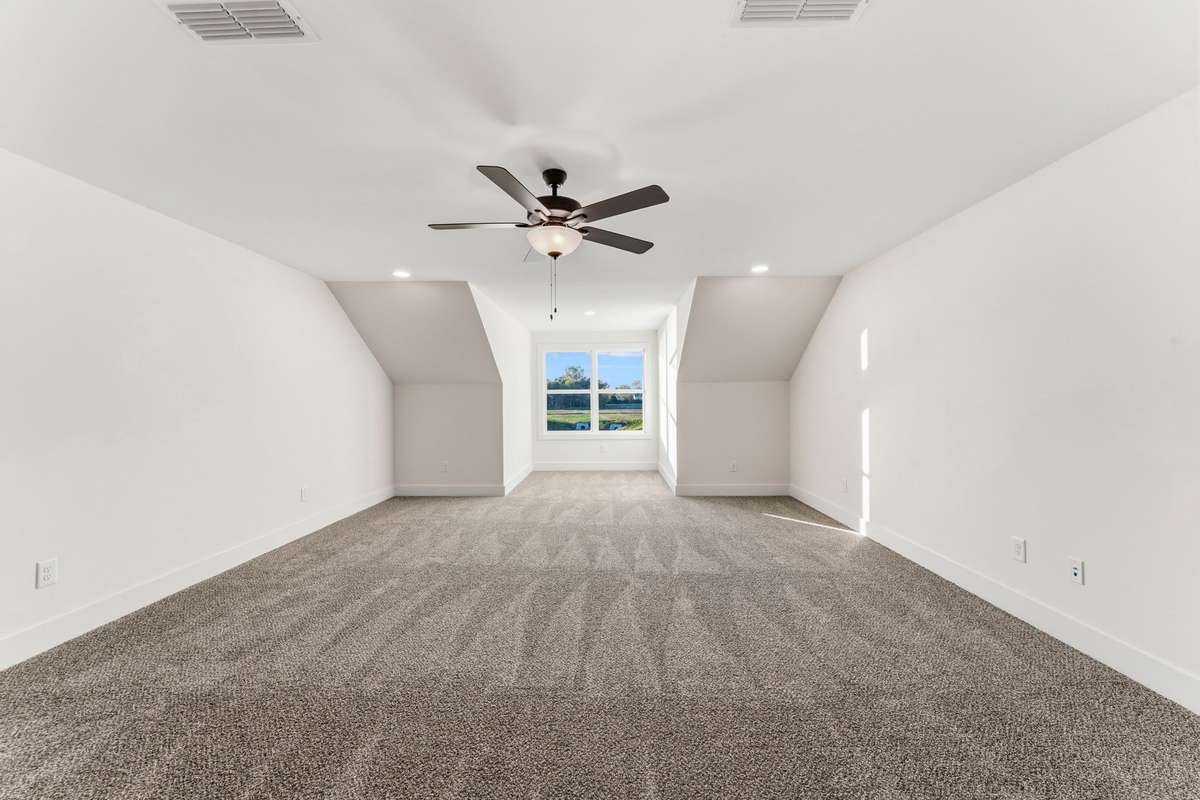 Upstairs, the bonus room captures all the extra square footage you need as well as the best view of the large pond and sunsets!