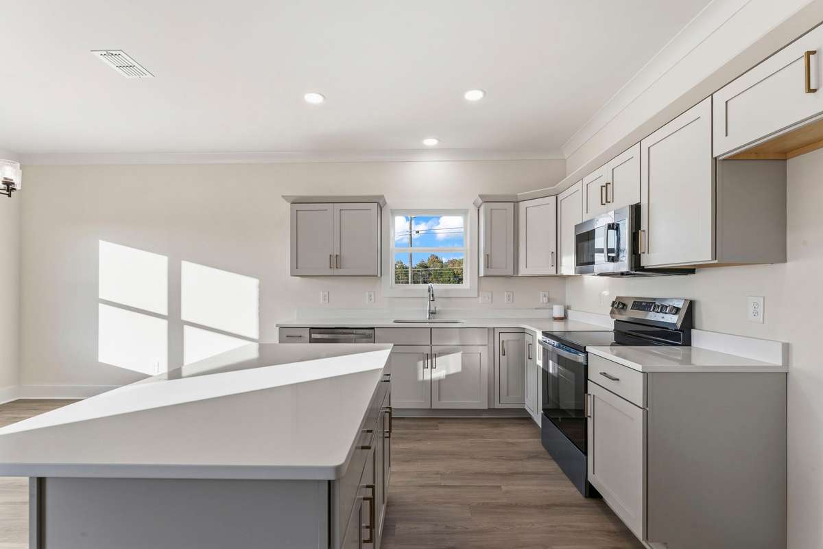 Enjoy the view of the neighborhood's front pond while doing dishes!
