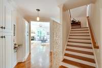 The hardwood continues on the stair treads.