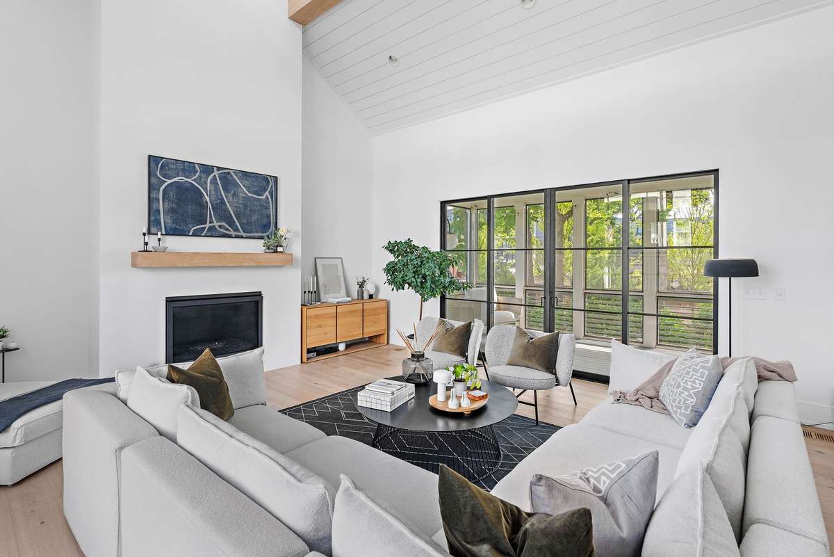 Beautiful sliding glass doors open to the screened porch and extend the Living space even further.