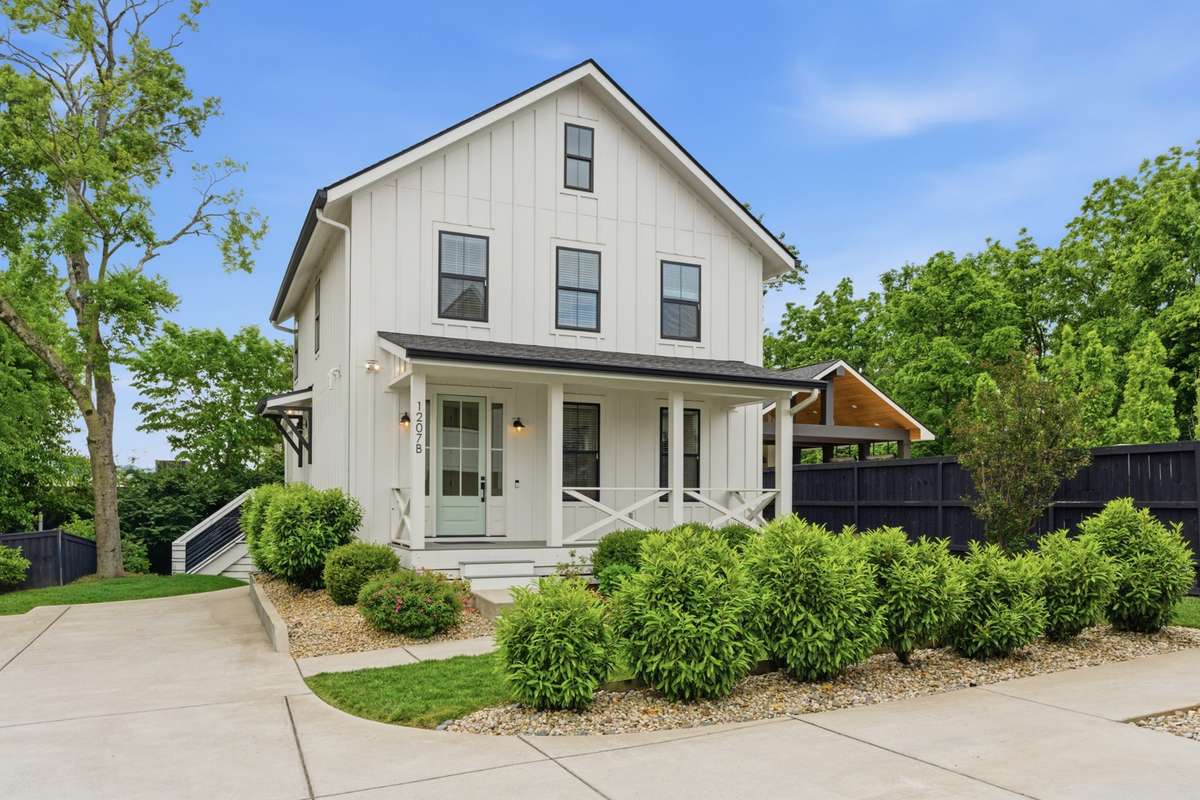 The second home is located at the rear of the expansive lot.