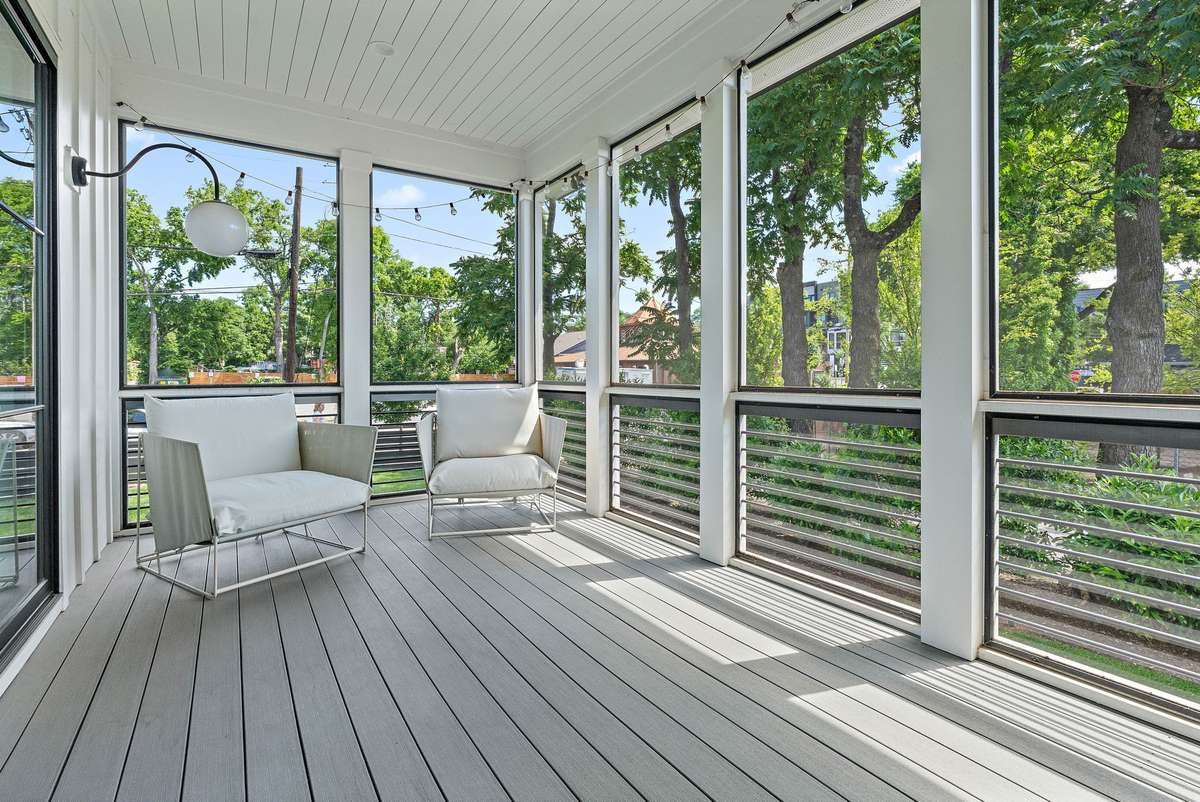 Sink into a good book or enjoy your morning coffee on the oversized, fully screened porch.