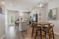 Dining space open to kitchen and living area