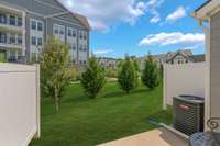 Out back is level and has trees! A great place to relax after a long day!