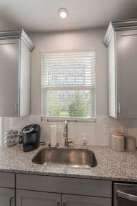 kitchen window overlooking treed area