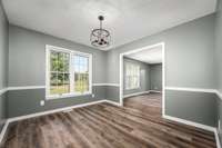 Double paned window in Dining Room with view towards the formal living room.