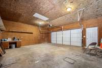 2 car garage with exterior door leading to the drive.