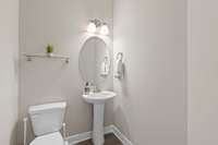 Half bath located on the main level for guests or ease for the homeowner
