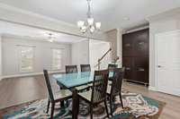 The cabinet fits perfectly into this nook or can be separated to one level with two pieces for a buffet.  The closet to the right has shelves perfect for your pantry and storage closet.