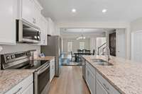 Granite counters, stainless appliances, it's all upgraded!  There is even a walk in pantry!