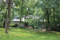 This home sits on a park-like lot of almost an acre.