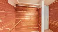 This cedar closet is located in the master bedroom.  There is also attic storage behind this amazing closet.