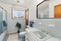 Stairs leading to the 3 bedrooms and full bath.