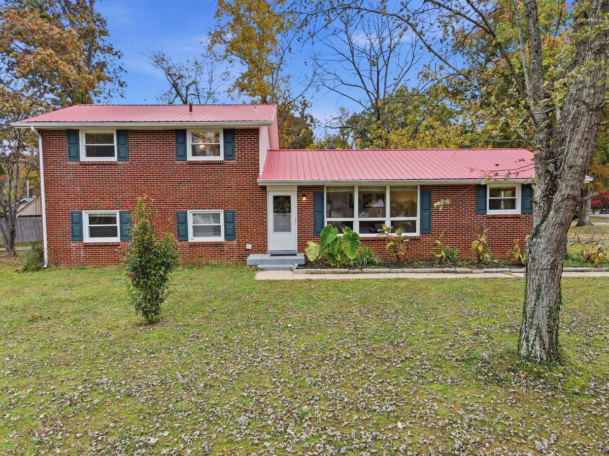 Beautiful mature trees surround this large corner lot.