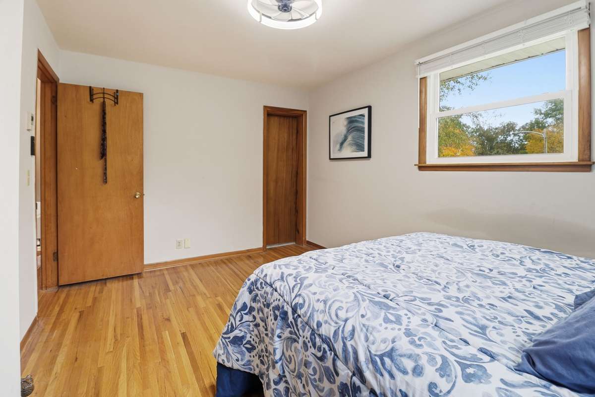 This bedroom has access to the bathroom.