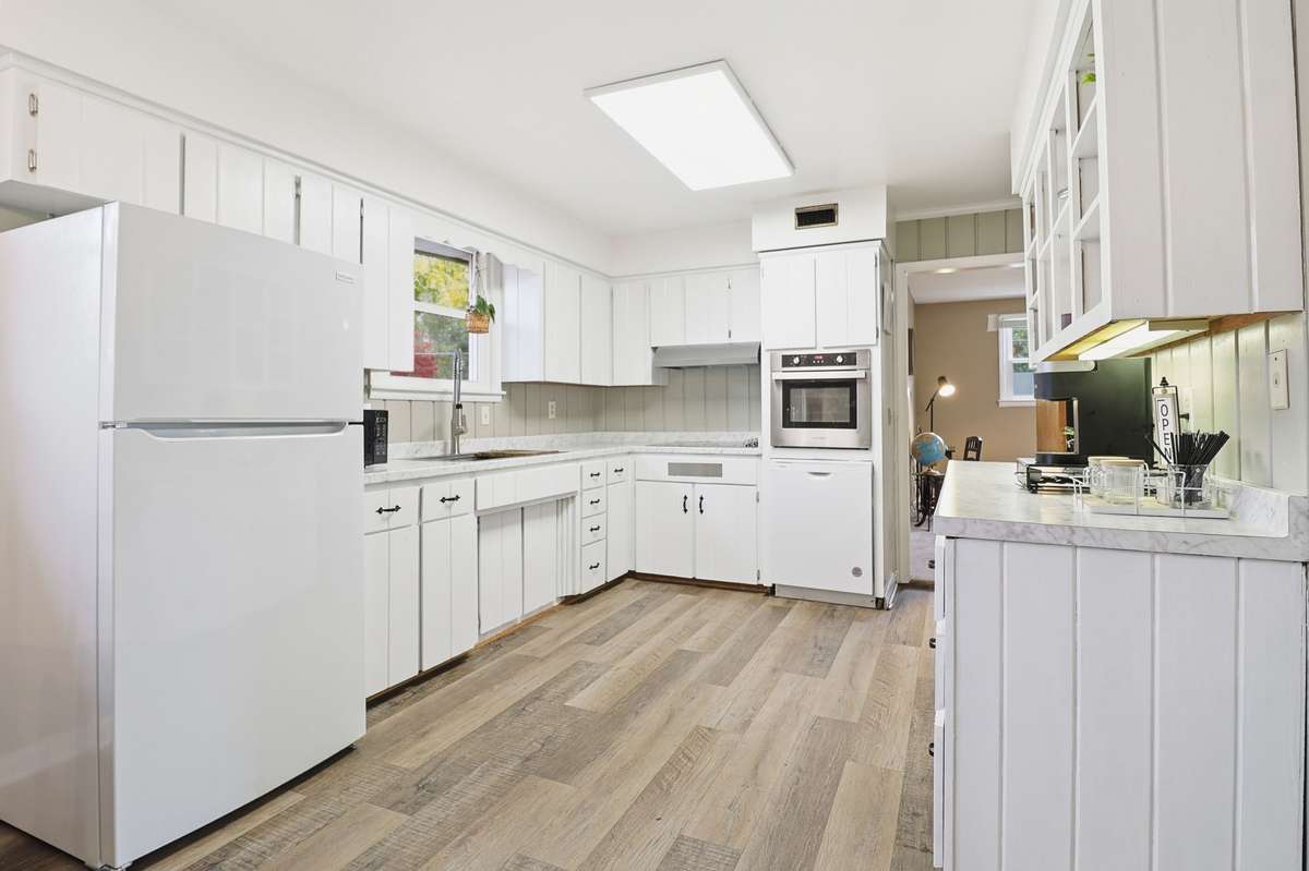 Original hard wood cabinets with all new appliances.