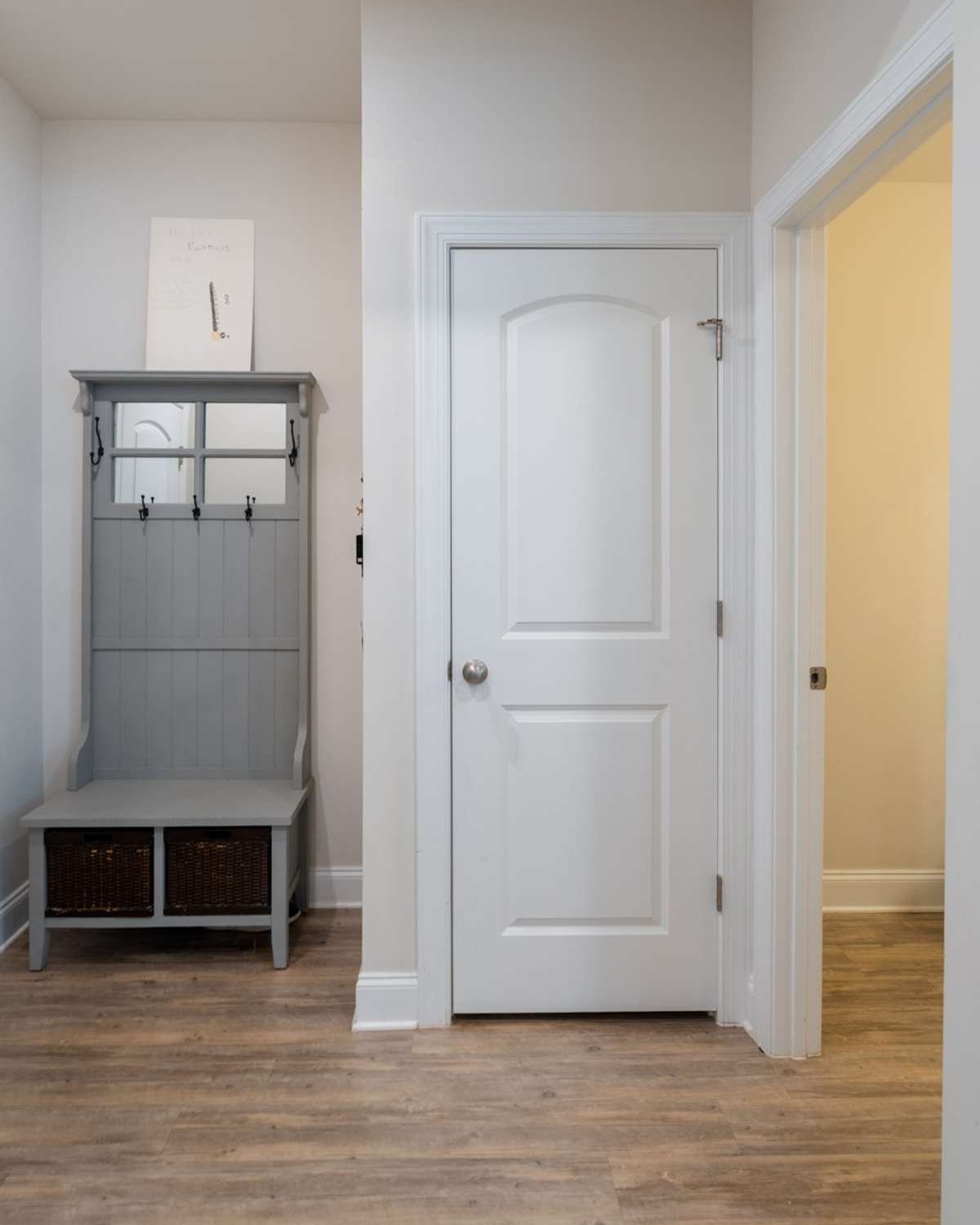 Conveniently designed mudroom leads directly to the 2-car garage, complete with an extra storage closet and easy access to the guest bathroom just off to the right.  
This area is perfect for keeping the home tidy with space for coats, shoes and bags