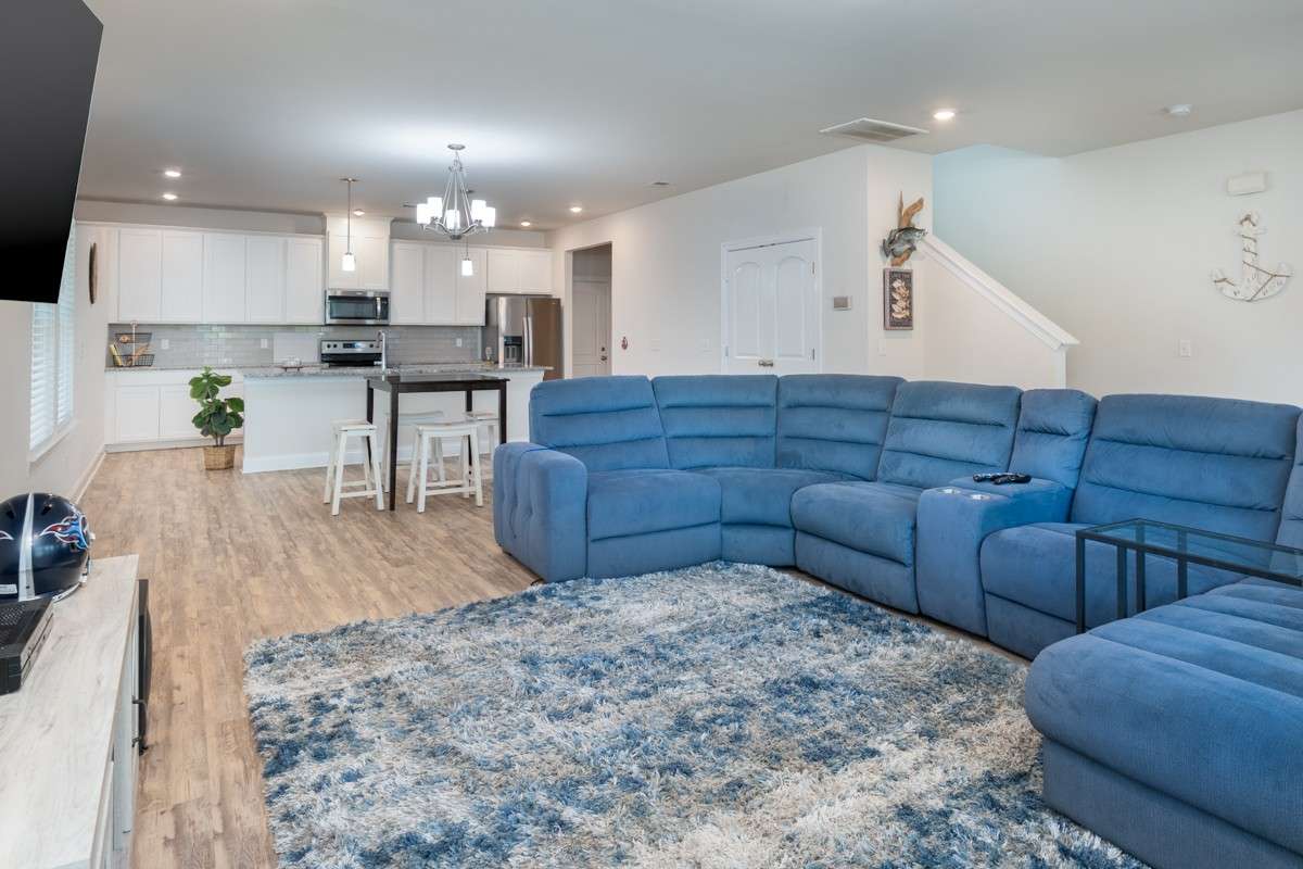 Step inside to a bright and open floor plan where the kitchen, dining, and living room flow seamlessly together. Stylish flooring and natural light throughout makes this home both inviting and functional.