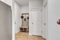 The door to the left of the mudroom leads you to the 2-car garage that offers a ton of space.