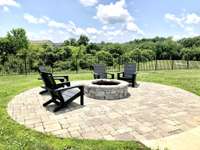 Find peace and quiet at this fire pit after a long day at work. Enjoy reading a book or just taking in the scenery.