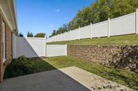 Private back patio with space to garden.