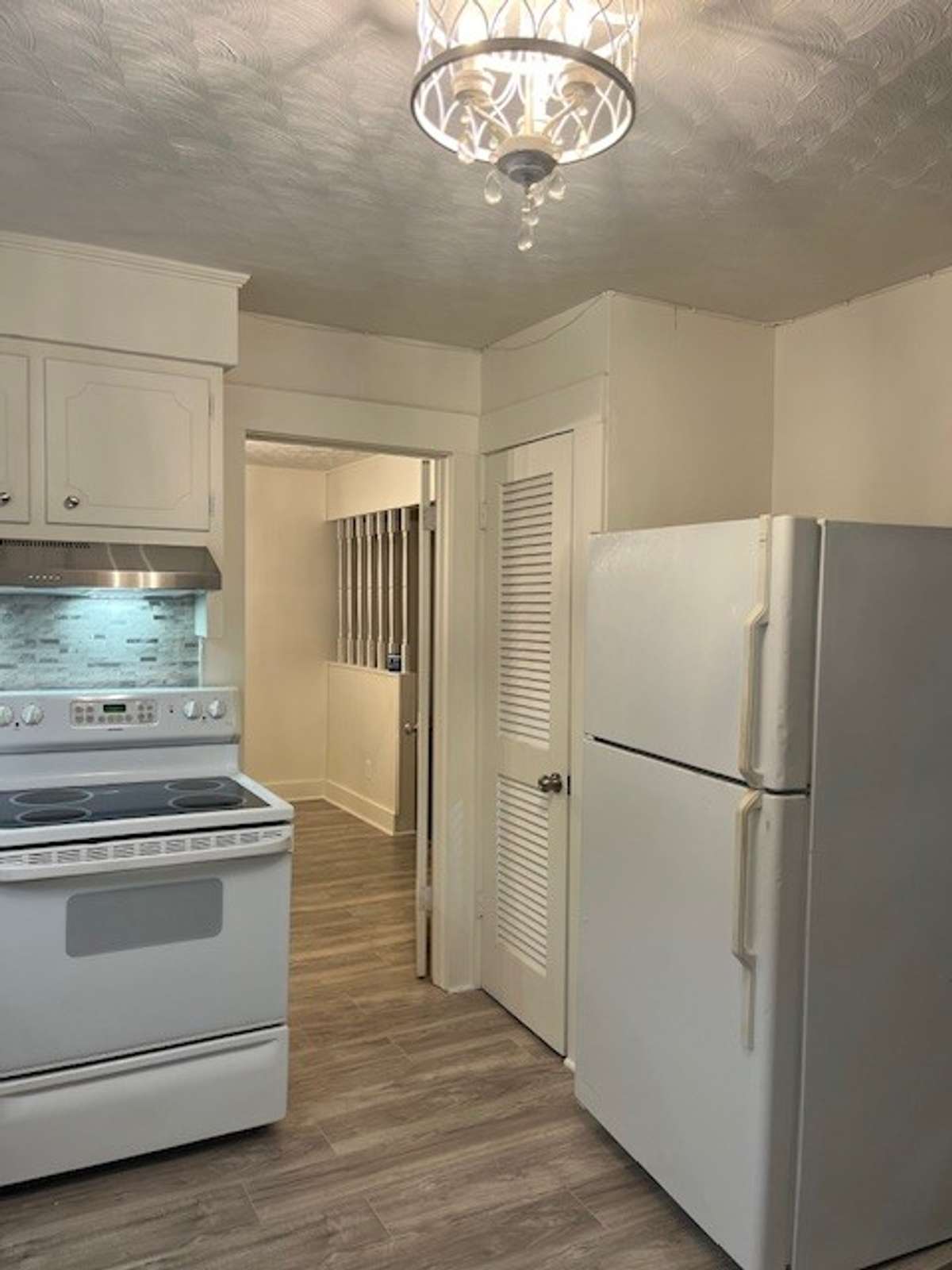 Kitchen with pantry.