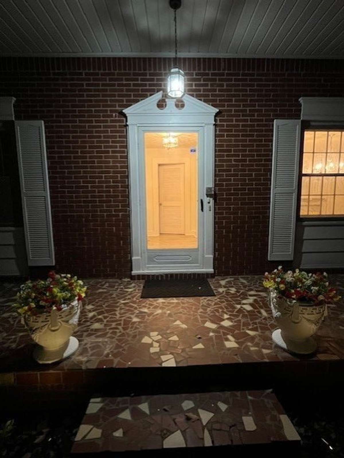 Front entrance with original beautiful tile.
