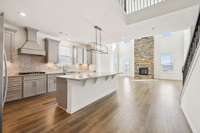 Kitchen open to the living room. Butlers walk through to dining room
