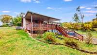 Beautiful outdoor area and back view of deck