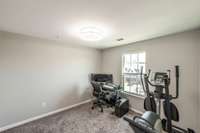 The third bedroom is currently being used as an office and home gym. This bedroom has a large closet for ample storage.