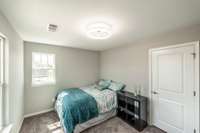 A substantial closet enhances Bedroom four, making it as functional as it is inviting.”