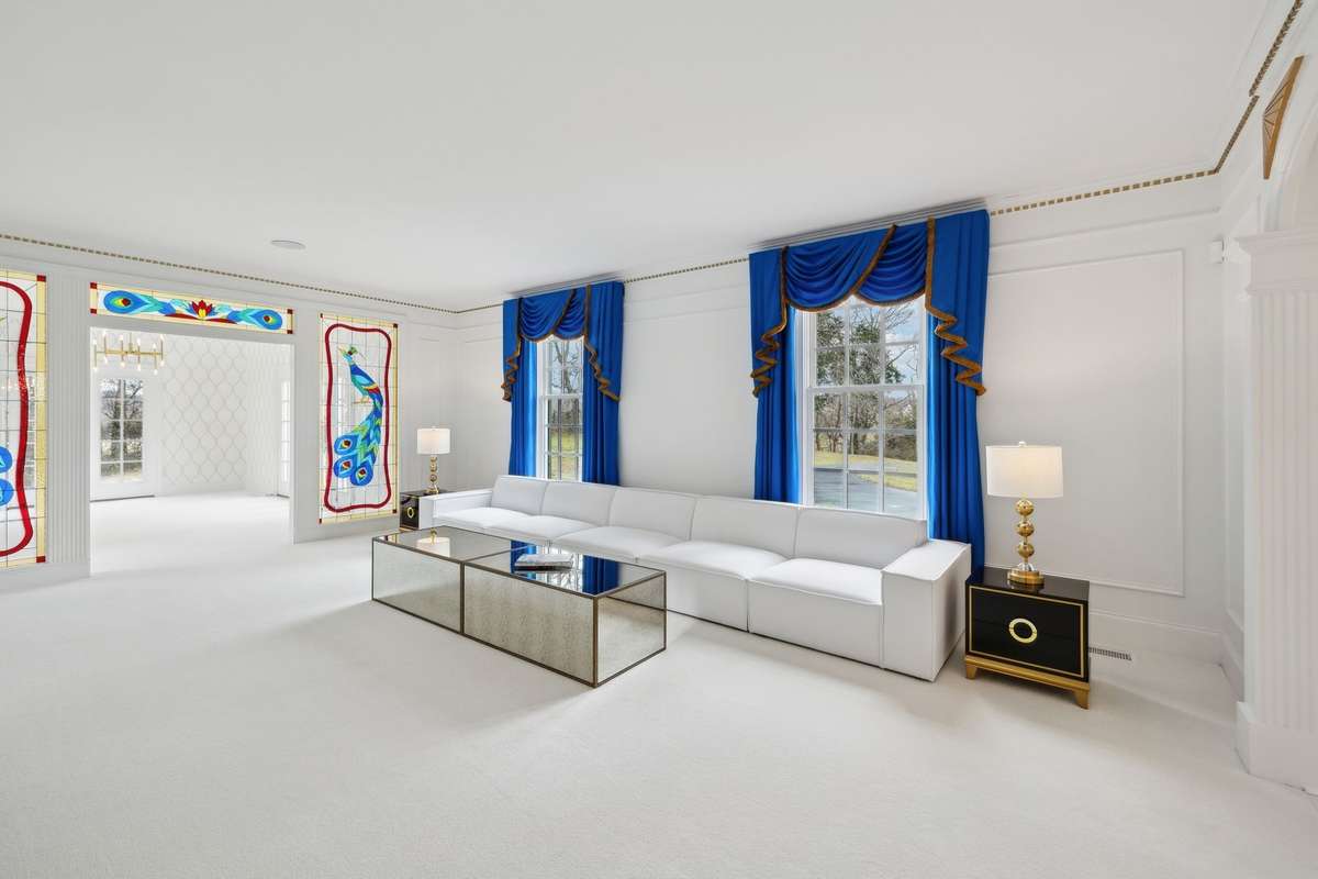 large formal entertaining space with adjoining music or sunroom