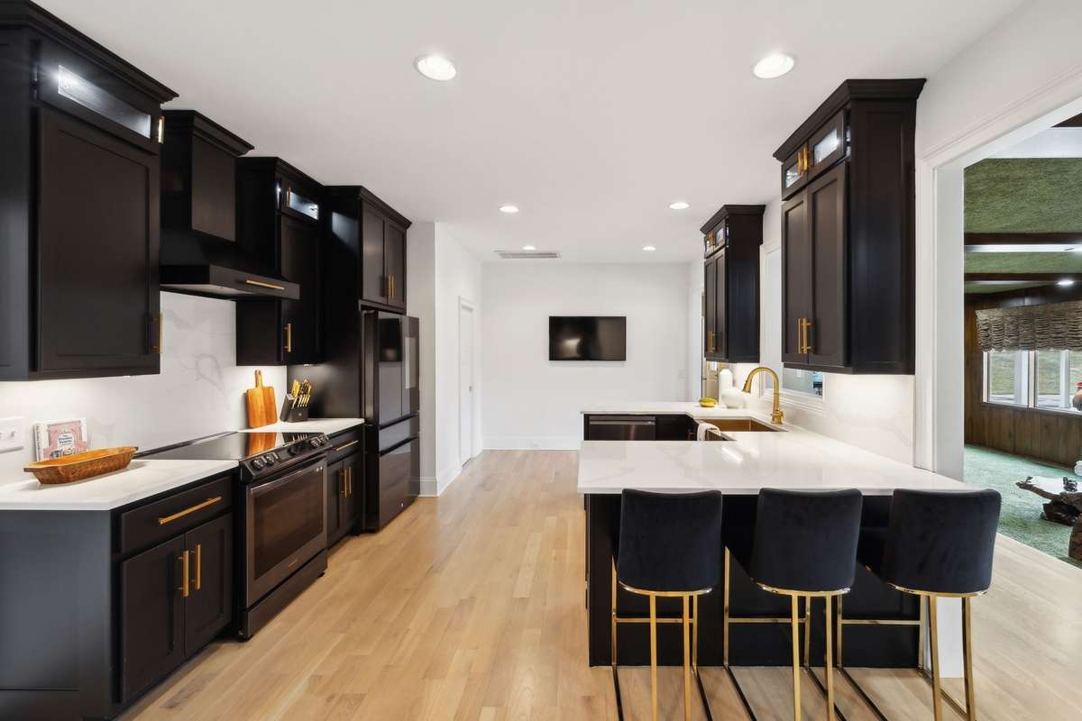 modernized kitchen with breakfast counter