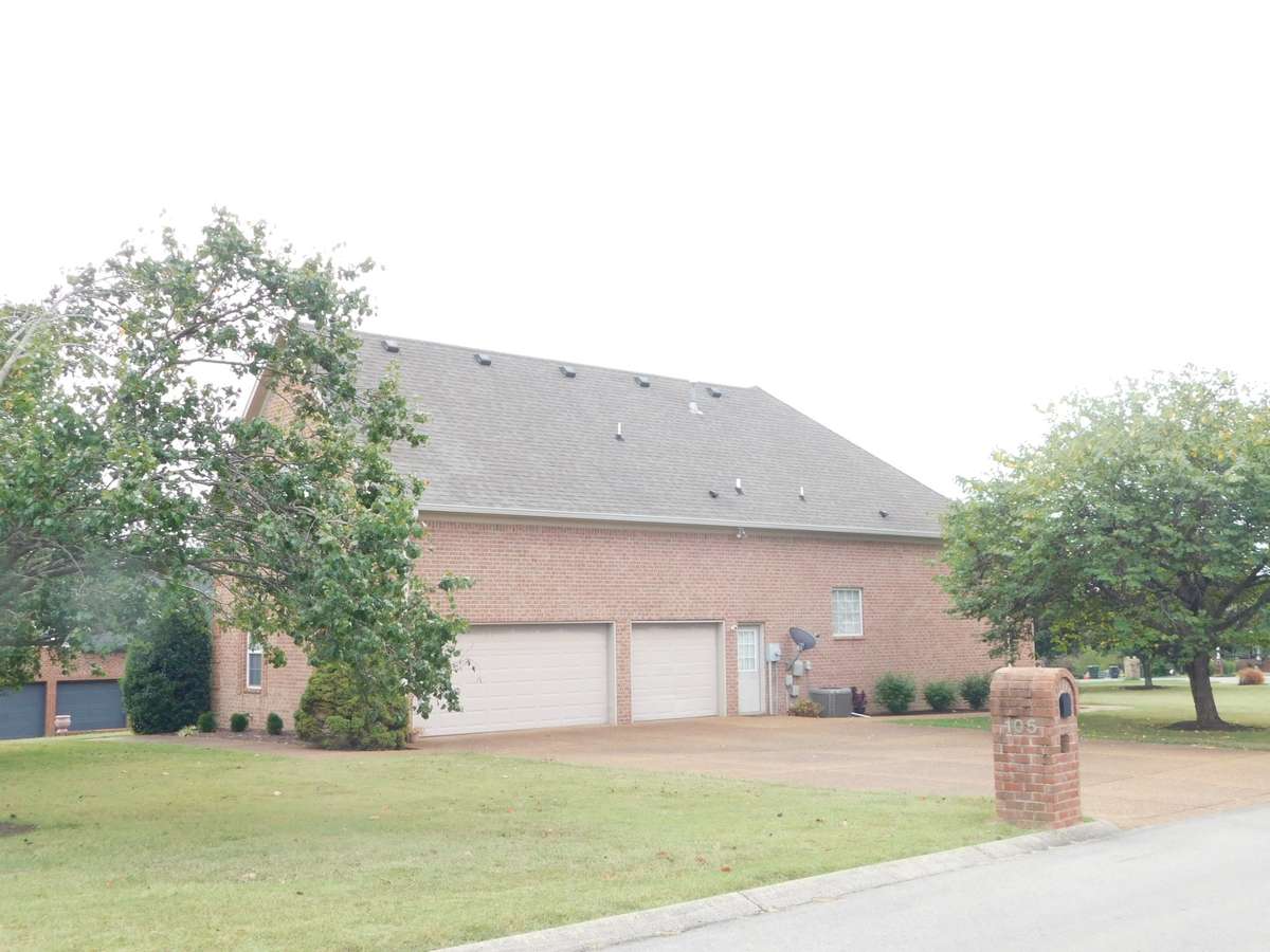 3 Car Garage, Aggregate Drive, Pedestrian doorway, all without steps and only 2 to
 enter the house