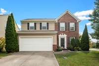 Welcome to 1200 Scarcroft Ln, a charming two-story home with timeless curb appeal and a warm invitation to step inside.