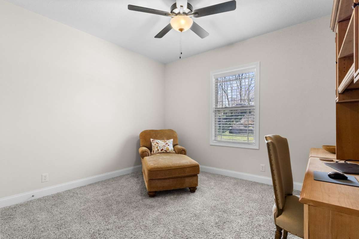 GUEST BEDROOM ON MAIN LEVEL IS BEING USED AS AN OFFICE