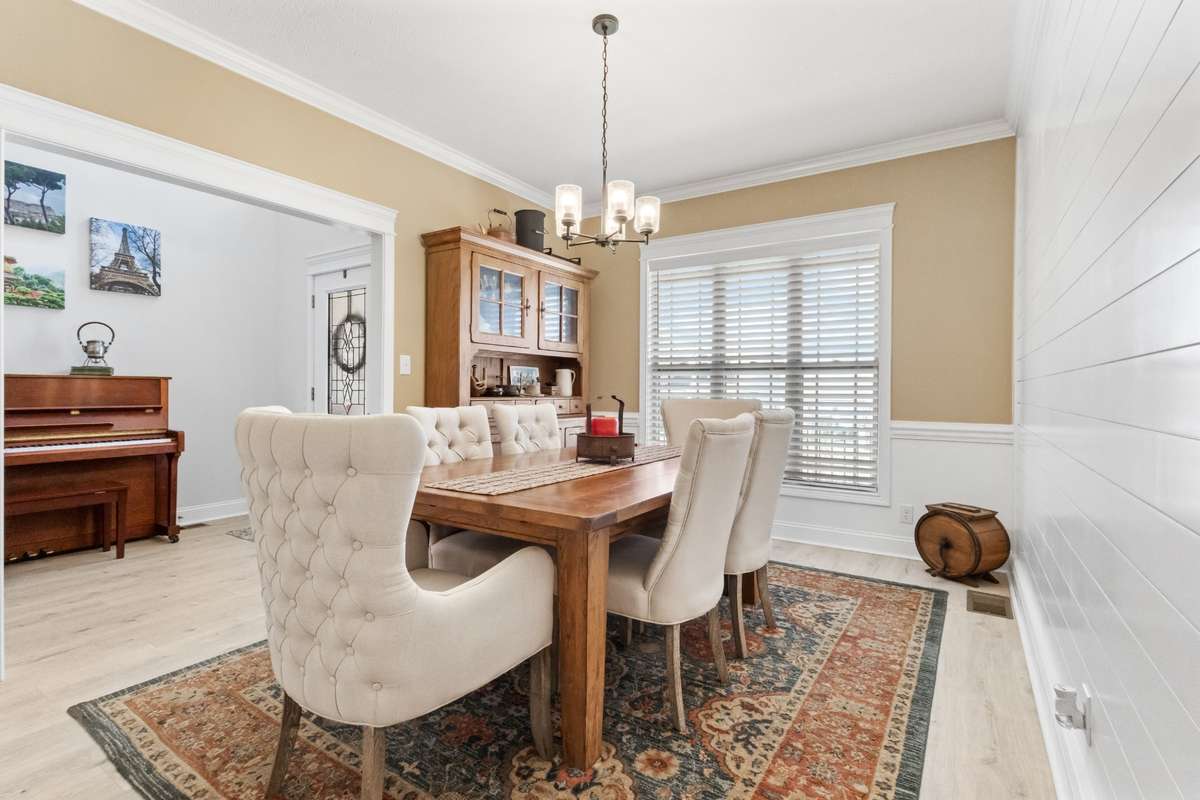 FORMAL DINING ROOM W/ SHIPLAP ACCENT WALL