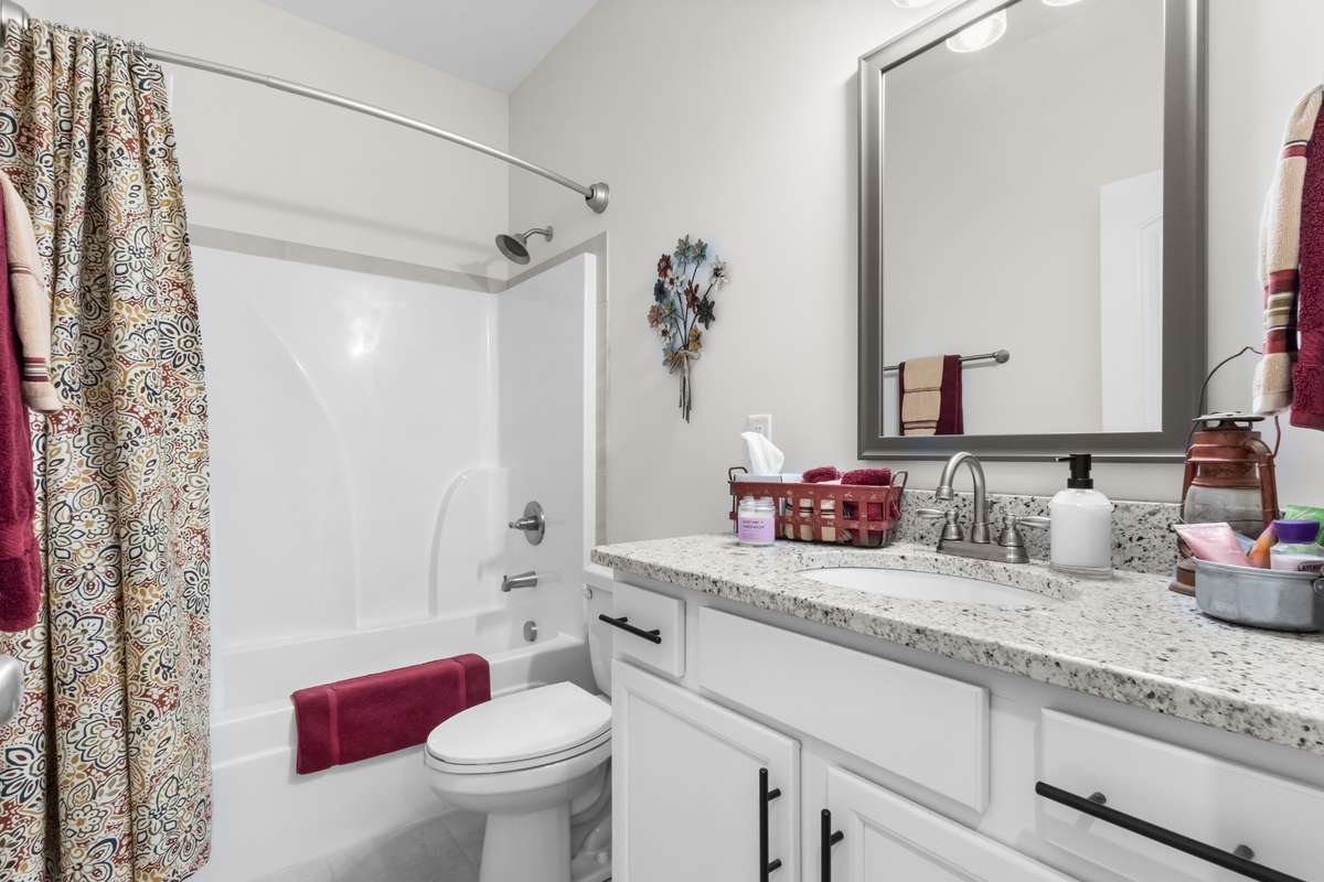 FULL BATH ADJOINING THE GUEST BEDROOM
