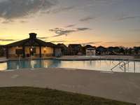 Located minutes from the neighborhood pool with separate kiddie wading pool with waterfall