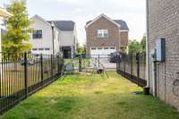 A nice view of the alley where the 2 car garage pull-in is