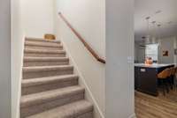 carpeted upstairs, which has been meticulously maintained in this shoe-free home