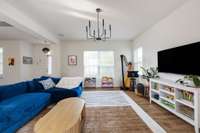 Windows on 3 sides of this room let in a beautiful amount of light