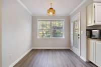 Eat in kitchen offers plenty of space and access to sunroom