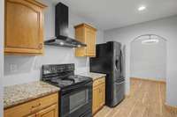 Sleek, matching appliances convey with the sale
