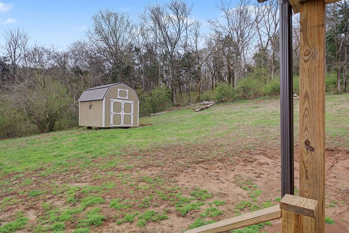 Storage shed included