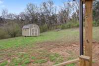 Storage shed included