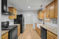 A galley kitchen leads to the Dining Room
