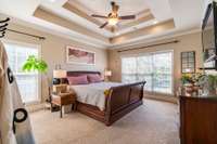 Double tray ceiling in primary bedroom.