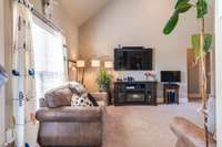 Abundant natural light from large floor to ceiling windows.